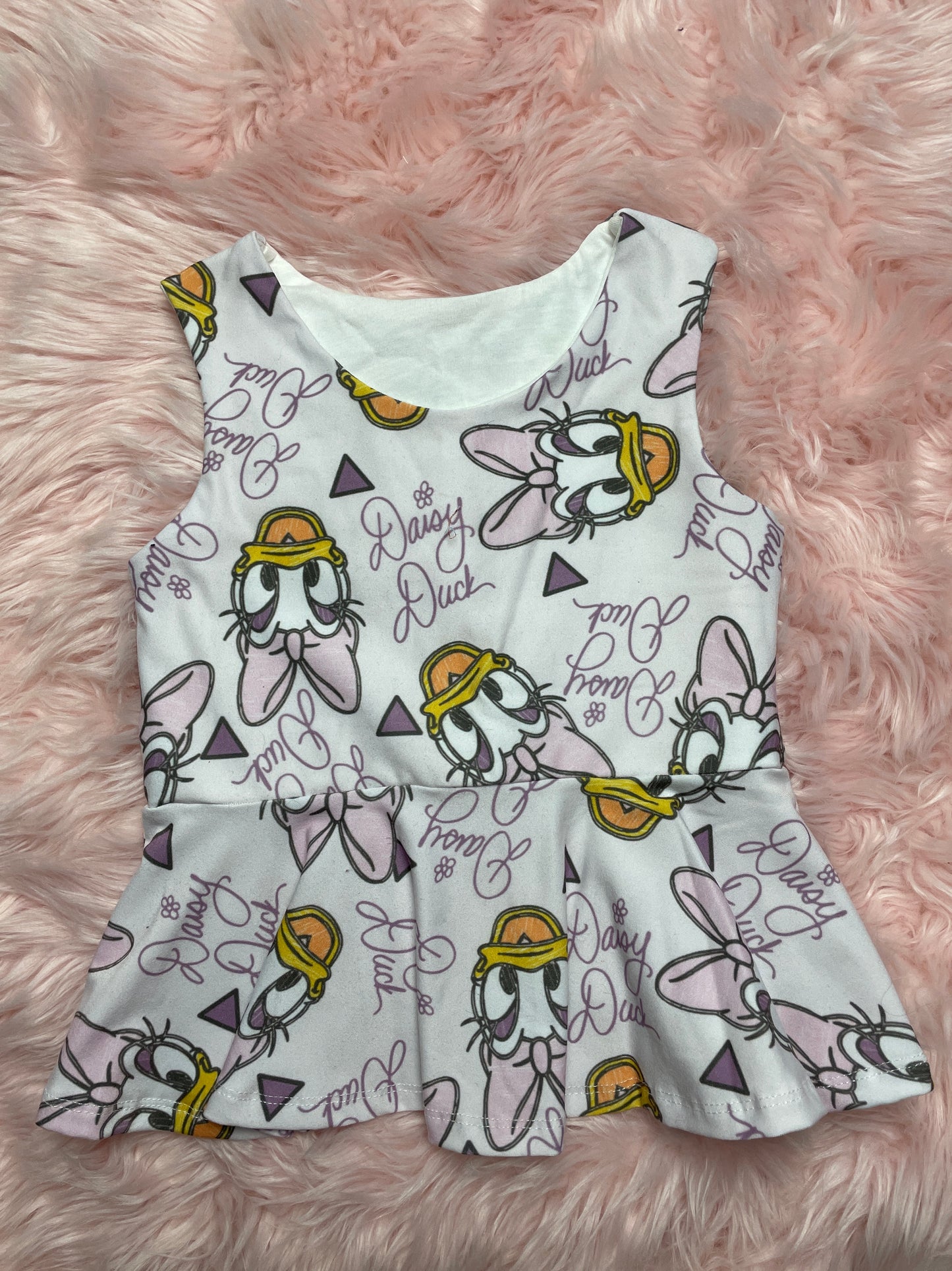 Daisy Peplum Tank size 24m